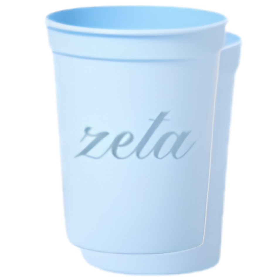 A light blue plastic cup with the word 'zeta' printed in a cursive font on the front, set against a plain white background.