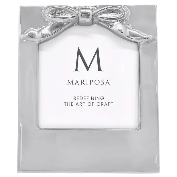 Silver photo frame with bow design and 'Mariposa' branding on a white background