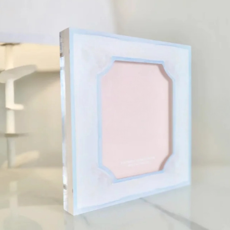 A square acrylic PICTURE FRAME