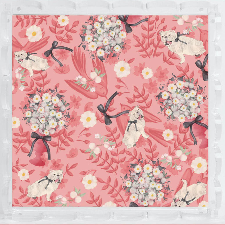 A square product shot of a white-framed art print featuring a pink floral pattern with white cats, white flowers, and red leaves, set against a solid pink background with the Sorority Sisterhood logo in the bottom right corner.
