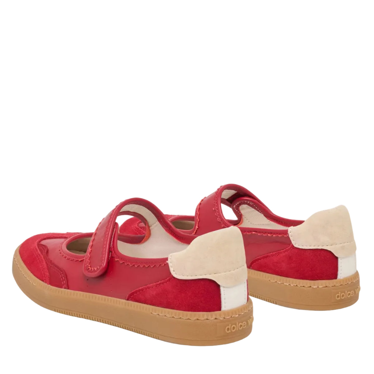 A pair of red Mary Jane sneakers with beige suede heel tabs and tan rubber soles, shown from a rear three-quarter angle on a light gray background.