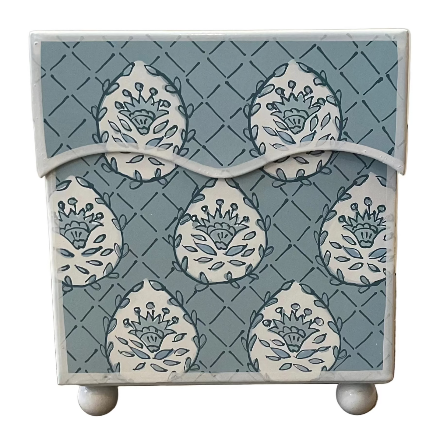 Decorative box with blue and white pattern on a white background