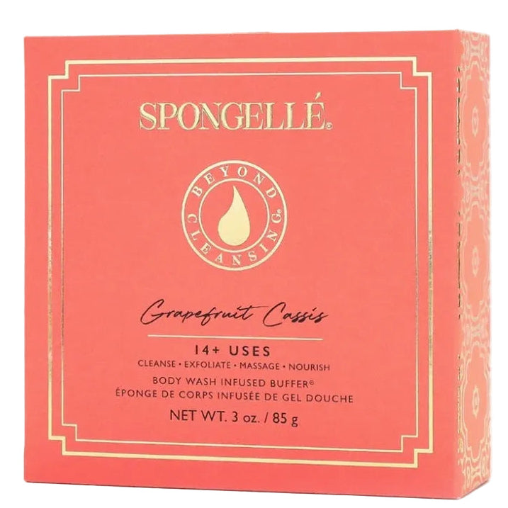 A red and white packaged Spongellé body wash infused buffer labeled 'Grapefruit Cassis' with 14+ uses, 3 oz. weight, and a floral pattern on the box.