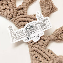 Load image into Gallery viewer, Sticker of a building with 'Athens, GA' text on a macrame wall hanging.