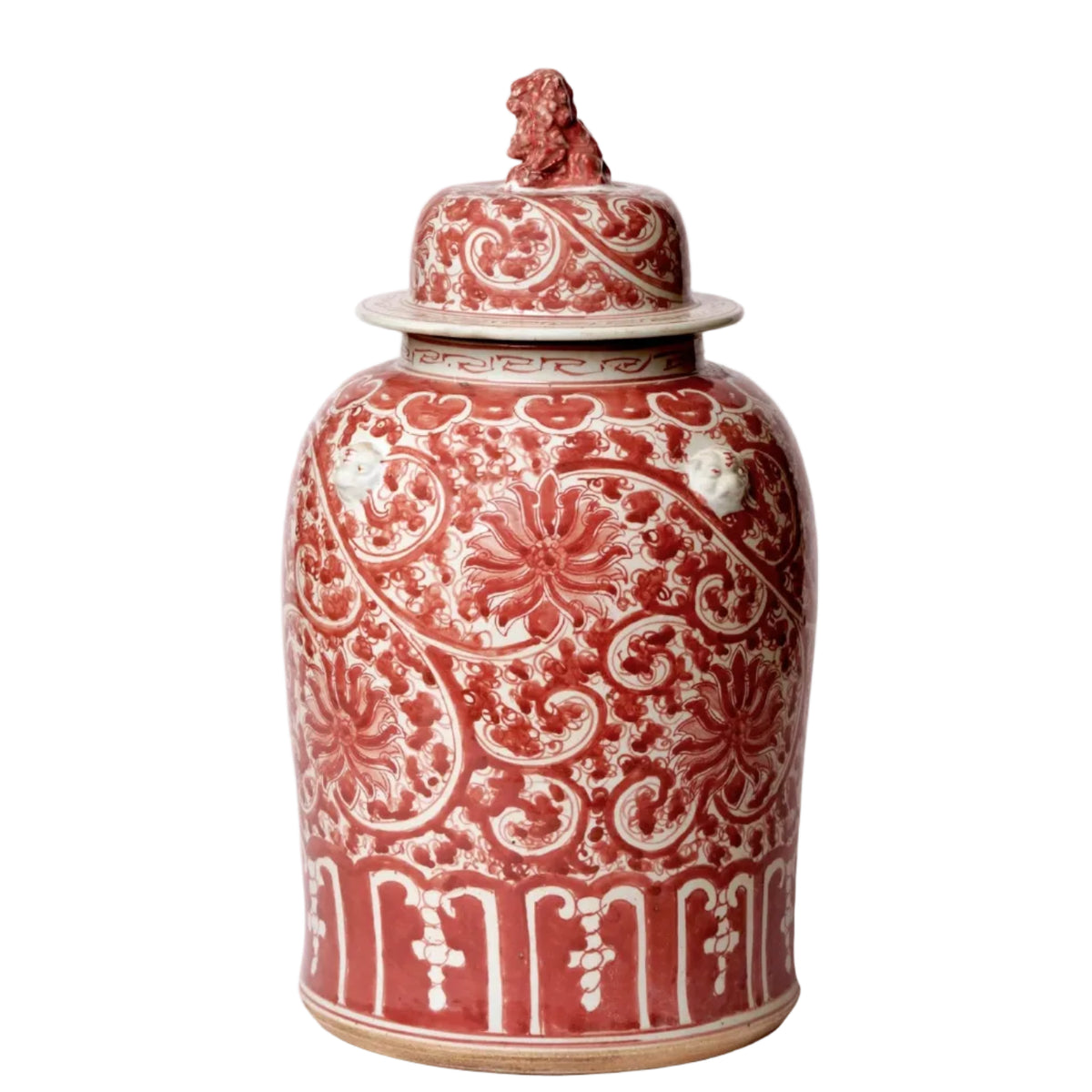 Decorative ceramic jar with intricate red and white patterns on a gray background