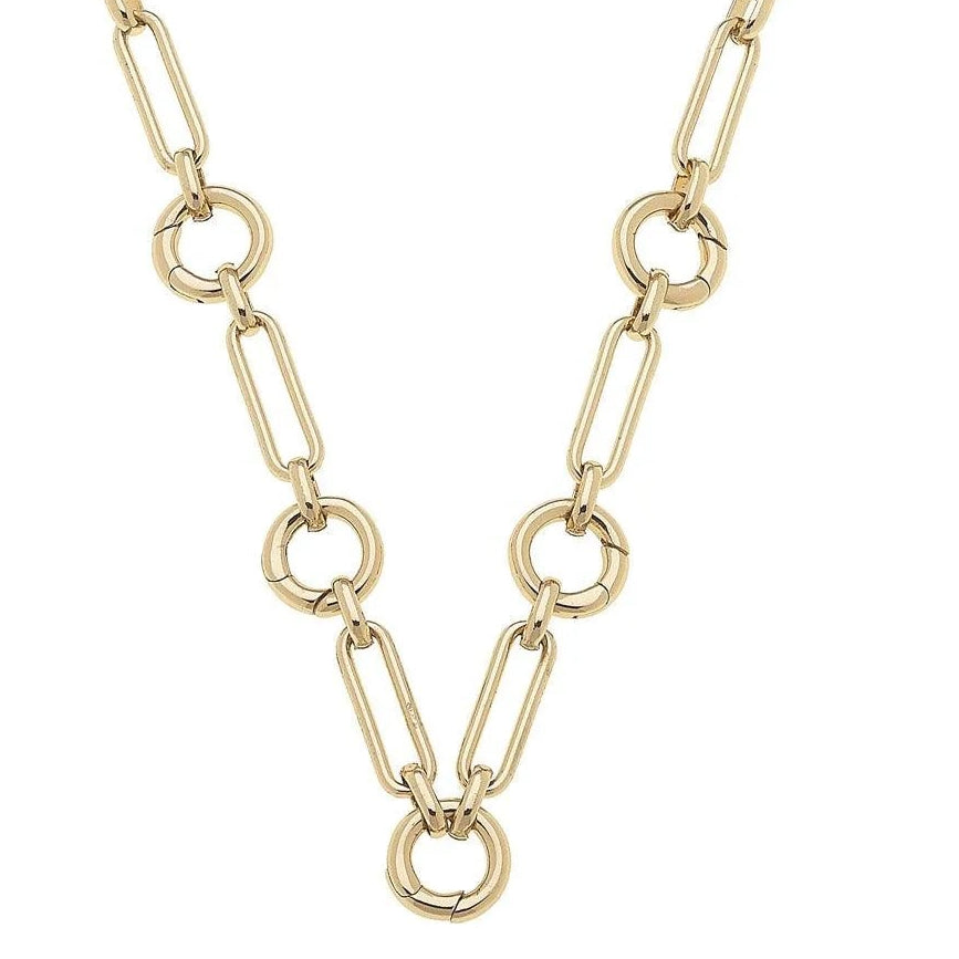 A shiny gold finish necklace with a thick chain and multiple charms attached.