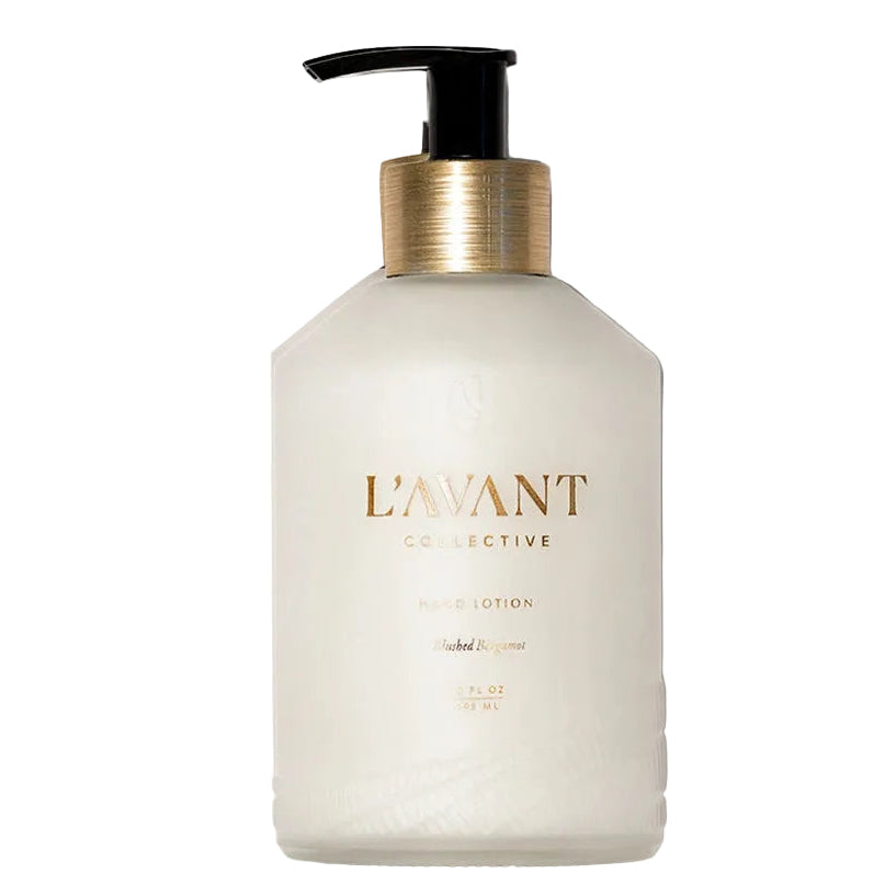 Hand lotion bottle with pump labeled 'L'Avant' on a white background