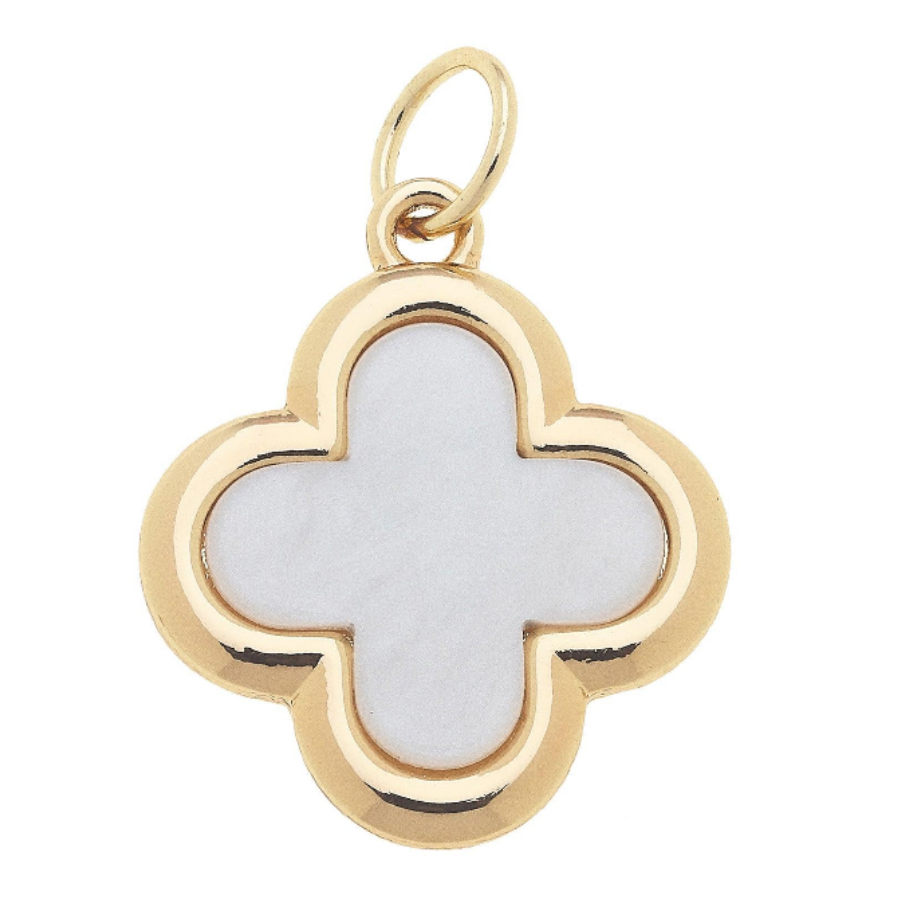 A gold four-leaf clover pendant charm with a white mother-of-pearl inlay, shown on a plain white background.