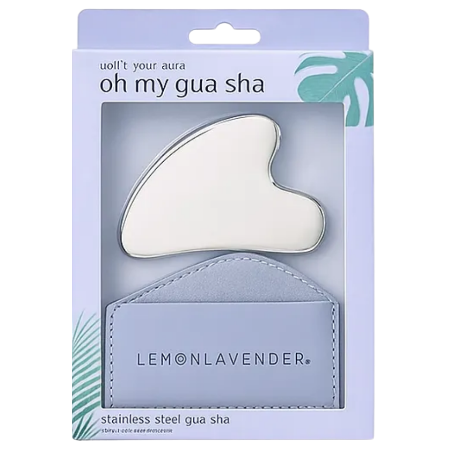 Lemon Lavender stainless steel gua sha set in its original packaging, featuring a white curved stainless steel tool and a light blue leather carrying case inside a lavender blister pack.