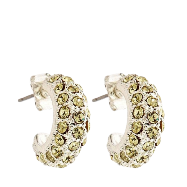 Silver crescent-shaped hoop earrings adorned with small round yellow-green rhinestones, shown on a plain white background.
