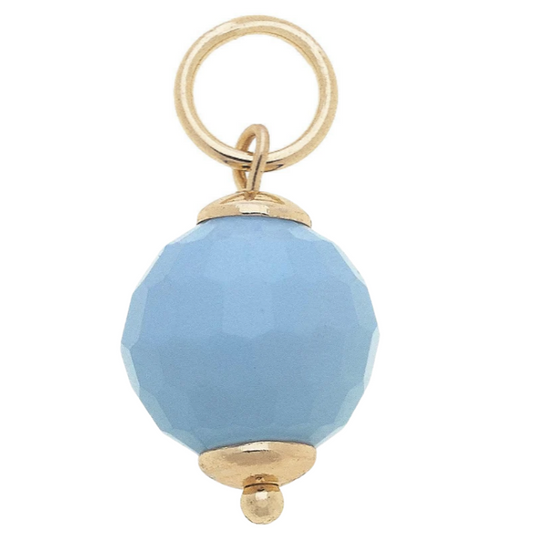 A faceted light blue bead charm with gold-tone metal caps, a top loop, and a small bead accent at the bottom, shown on a plain white background.
