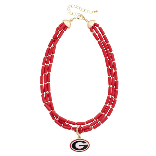 A red beaded necklace with a gold-tone extender chain and a Georgia Bulldogs 'G' logo charm, displayed on a clean white background.