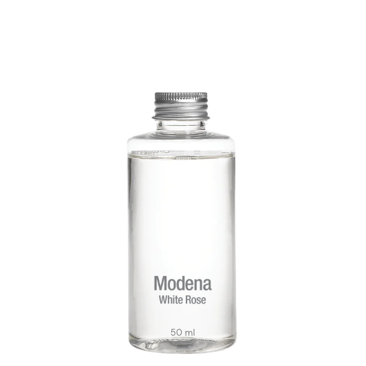 A clear glass bottle of Modena White Rose fragrance with a silver screw cap, centered on a plain white background.