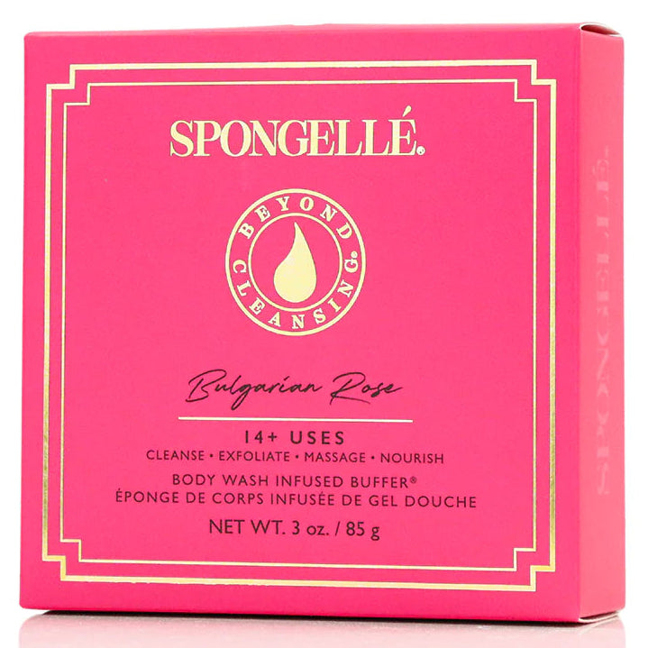A pink rectangular box of Spongellé Beyond Cleansing Body Wash Infused Buffer in Bulgarian Rose scent, featuring gold lettering and borders on a white background.