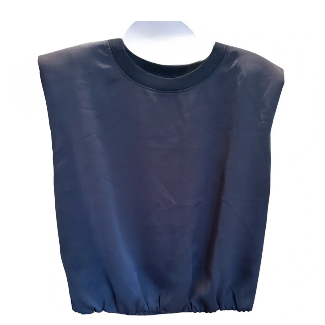 A dark navy blue sleeveless crop top with a gathered elastic hem, displayed on a white mannequin torso against a plain white background.