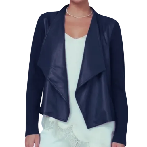 A model wearing a dark navy blue wrap-style jacket over a white top and white pants, shown against a plain white background.