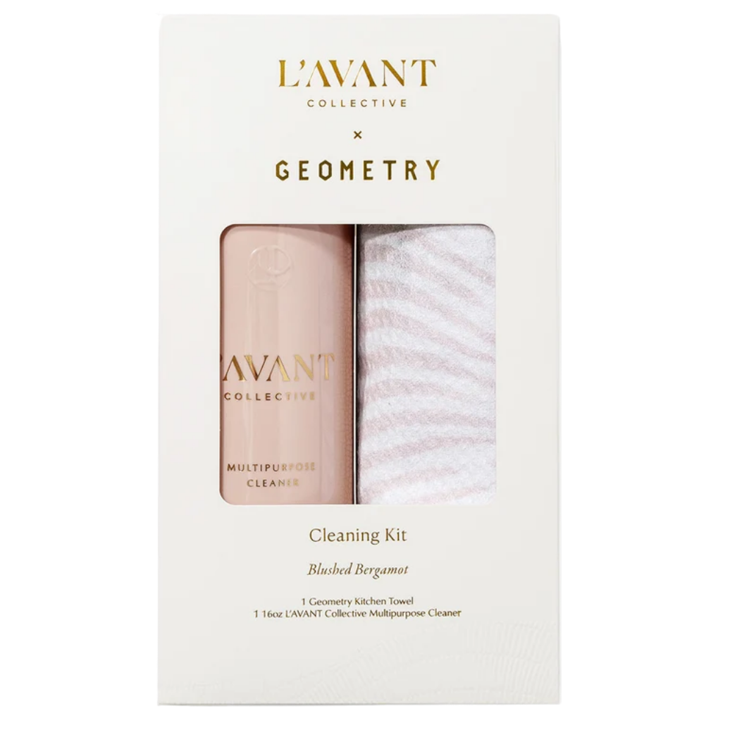 LAvANT COLLECTION x GEOMETRY Cleaning Kit in a white box with a clear window showing a pale pink bottle and a white striped cloth.