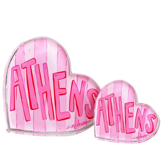 Two pink striped heart-shaped acrylic shelfies with the word 'ATHENS' in bold pink letters, shown on a plain white background.