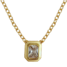 A gold chain necklace with a rectangular bezel-set CZ pendant, displayed on a solid white background.