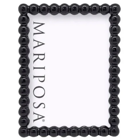 A rectangular black beaded frame with the brand name 'MARIPOSA' printed vertically in black on the white center, isolated on a white background.