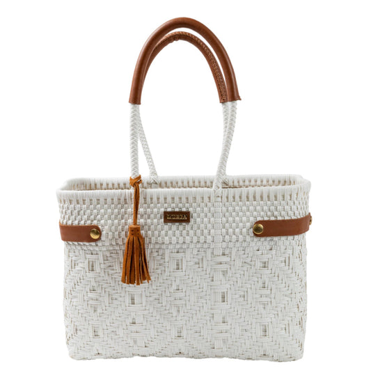 White woven handbag with brown handles and accents on a white background