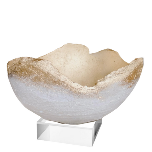 A natural stone bowl with a textured, organic shape and a polished white base, displayed on a clear acrylic stand against a white background.