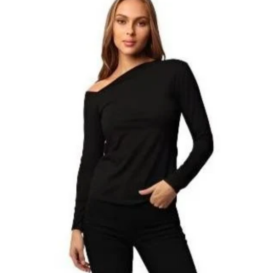 A woman modeling a black long-sleeve top with an asymmetrical off-shoulder design, paired with black pants, set against a plain white background.