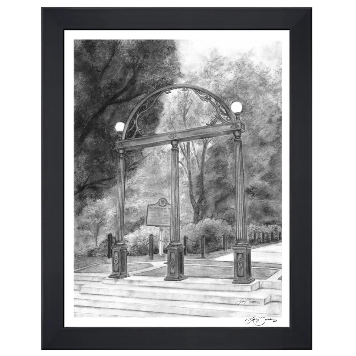A framed black and white sketch print of the University of Georgia Arches with North Campus in the background, shown in a black frame against a white backdrop.