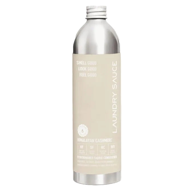 A silver aluminum bottle of Himalayan Cashmere Laundry Sauce, a hypoallergenic performance fabric conditioner, centered on a light gray background with a black 'HYPOALLERGGENIC' label in the top-left corner.