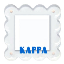 Load image into Gallery viewer, White decorative frame with blue &#39;Kappa&#39; text on a white background
