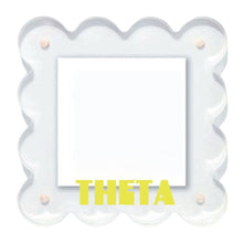 Load image into Gallery viewer, Clear frame with scalloped edges and &#39;THETA&#39; text on a white background
