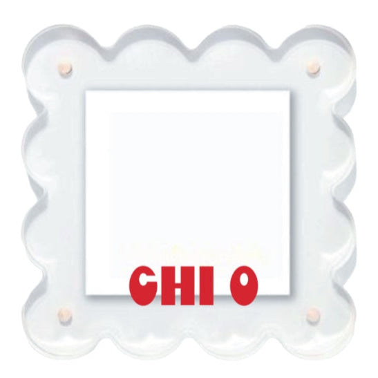 White scalloped frame with a red 'CHI' on a white background
