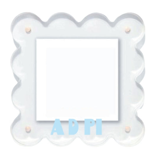 Decorative white frame with scalloped edges on a white background, featuring the text 'AD PI'.