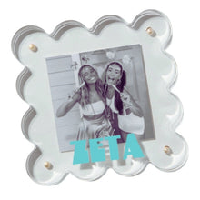 Load image into Gallery viewer, Decorative photo frame with a picture of two people and the word &#39;ZETA&#39; on a white background
