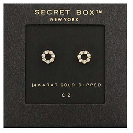 A pair of gold-dipped stud earrings with clear crystal-like accents, presented on a black Secret Box New York display card.