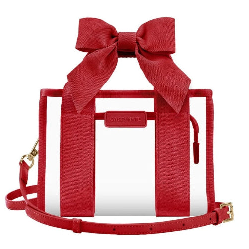 A red and white striped handbag with a large red bow on top, a red shoulder strap, and gold-tone hardware, shown against a plain white background.