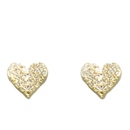 Heart-shaped gold earrings with clear stones on a light gray background