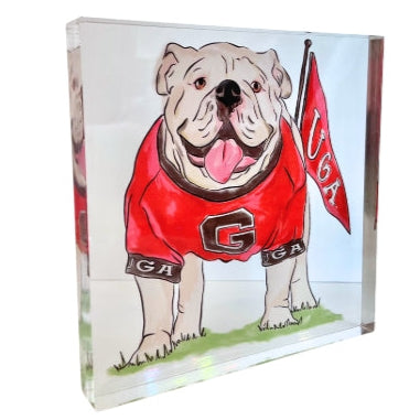 Acrylic block with a bulldog wearing a red jersey and holding a flag on a clear background