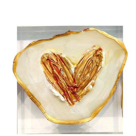 A heart-shaped resin plaque featuring a textured gold and brown heart design in the center, surrounded by a white background with a gold border.