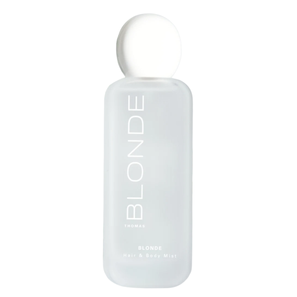 A frosted glass bottle of BLONDE Paris Blondes Bloom + Balm Hair Mask with a white spherical cap, centered on a solid white background.