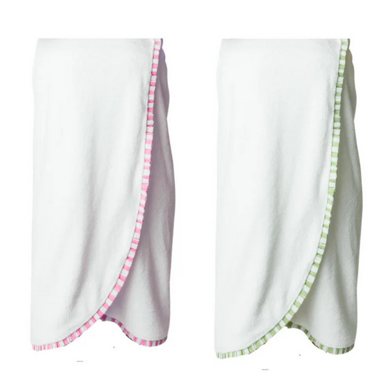 Two white baby wraps or swaddle blankets with gingham trim, shown side by side on a plain white background. The left wrap has pink trim, and the right wrap has green trim.
