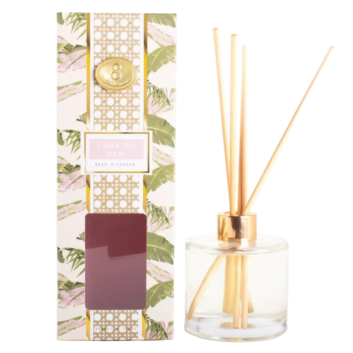 Reed diffuser with floral packaging on a white background