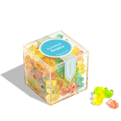 Box of colorful gummy bears with a clear lid on a white background